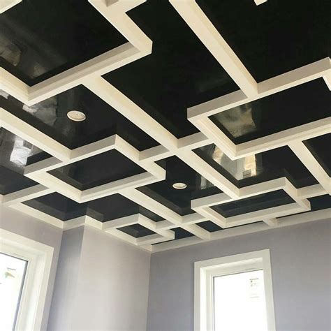 Installing ceiling drywall is a very simple process, but can be slightly challenging when working alone. Custom drywall pattern finished with black grassello ...