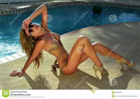 Users rated the flexible posing in the pool videos as very hot with a 78% rating, porno video uploaded to main category: Fashion Model Posing Pretty By Swimming Pool Royalty Free ...