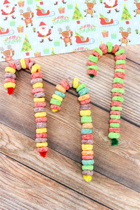 If nature crafts are your thing you just have to give these twig christmas tree ornaments a go. Fruit Loop Candy Cane Ornaments - Easy Kids Friendly Craft