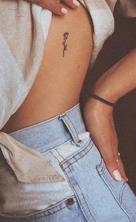 You can learn more about flower tattoo symbolism here: #simpletattoos in 2020 | Rose rib tattoos, Classy tattoos ...