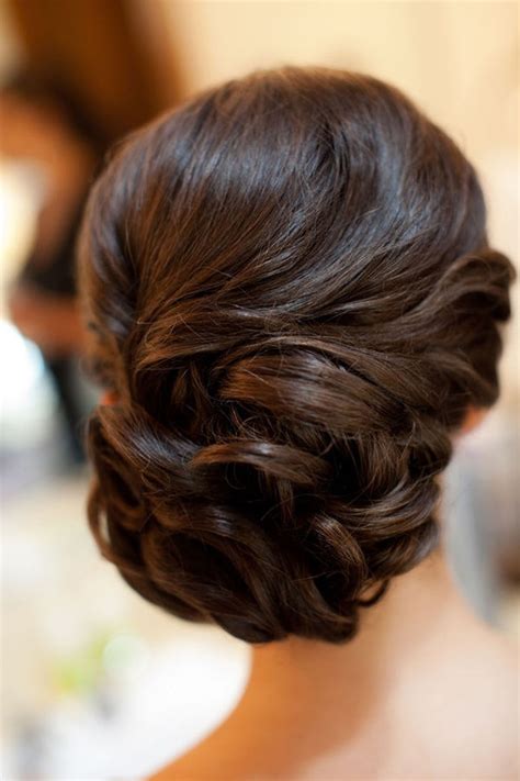 The hair is pulled out from many sides to create multiple layered buns. {Wedding Hairstyles} : Updo - Part 2 - Belle The Magazine