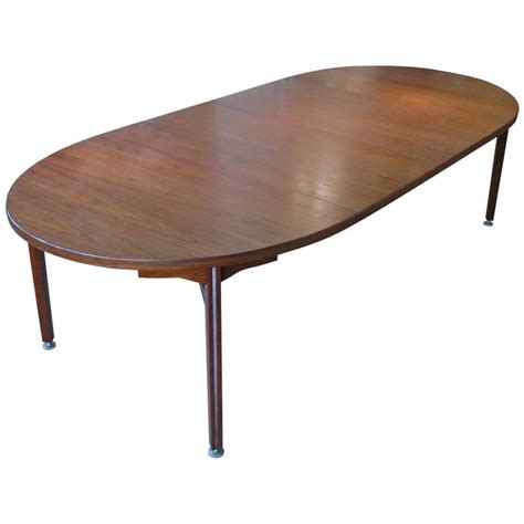 The signature design by ashley danbeck rectangular dining room extension table has been created in the style of a classic farmhouse table. Oval Walnut Extension Dining Table by Jens Risom For Sale ...