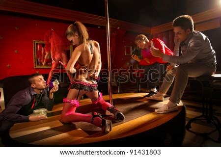 Hot girls celebrating birthday with male strippers. View Men Offering Money Stripper On Stock Photo 91032593 ...