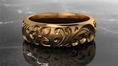 Perhaps she chooses birthday cards with a paisley or sunflower motif and you can find a floral wedding band with engraving evocative of that preference. Hand Crafted Engraved Wedding Band by Arney Guess ...