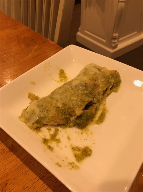 The enchiladas are topped with a tangy and bright tomatillo sauce and sprinkled with cheese before baking. America Test Kitchen Roasted Poblano Enchiladas : America ...