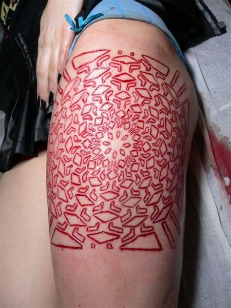 Misty has been battling hard through the proper channels for better body art industry regulation. Amazing skin scarification pattern on thigh - Tattooimages.biz