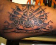 This clever creole design is sure to inspire. Haitian flag tattoo | Haiti | Haitian tattoo, Haiti tattoo ...