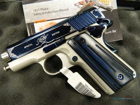 White pearl synthetic with silver, engraved iver johnson logo. Kimber Sapphire Ultra II special edition in 9MM... for sale