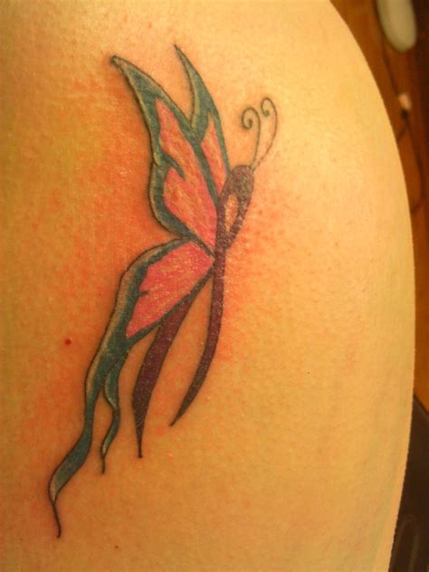 If you are looking to get fonts along the side, you can try out something like a tattoo on the breast. 27 Breast Cancer Ribbon Tattoo Design - EntertainmentMesh