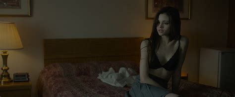 Look away behind the glass. Look Away starring India Eisley, Jason Isaacs & Mira Sorvino