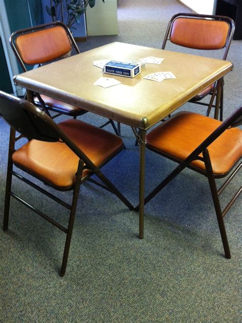 For many, it's the thrill of playing poker, guessing who's bluffing and who's hiding a set of four aces. Cool! Vintage card table and folding chairs made by ...