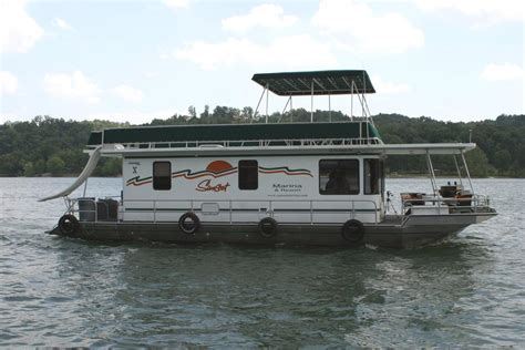 Be your own captain and capture the . 50' Family Cruiser Houseboat on Dale Hollow Lake