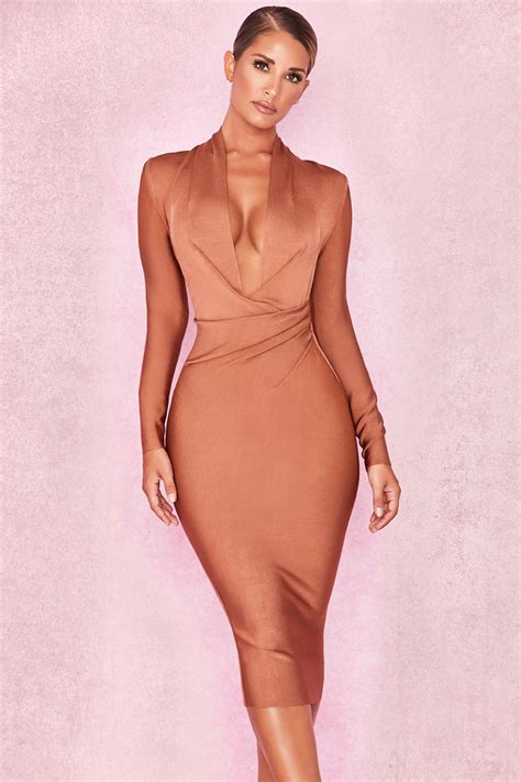 Camel bandage strappy bodycon mini dress featuring a cut out front and back zip fastening. Shop/Clothing/Dresses/Shop celebrity and runway inspired ...