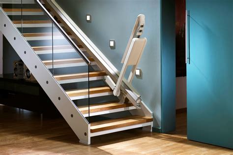 Frameless glass bannister face fixed to timber staircase with a stainless steel handrail fixed to both the glass and the. Glass Banister Cost - House Elements Design