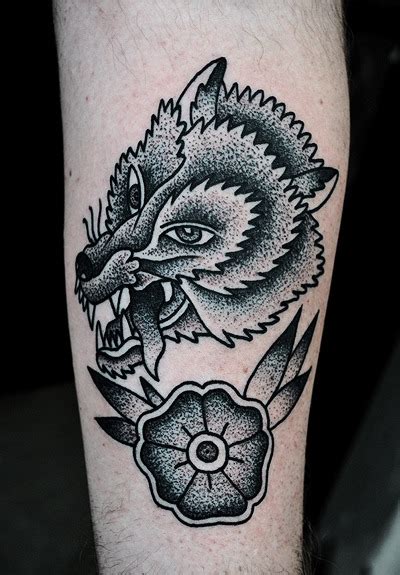 His first tattoo was a bad tribal on his forearm. Mike Adams Tattoo Wolf