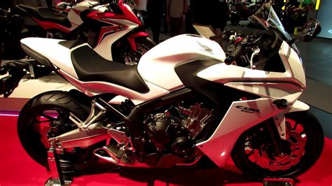 A standard halogen headlight gets twin led running lights in the upper corners. 2014 Honda CBR650F White Walkaround - 2013 EICMA Milan ...