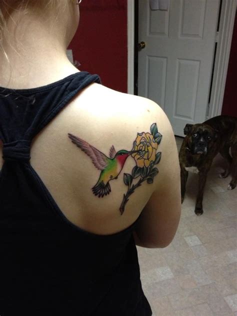 Yellow hibiscus tattoos also represent optimism, a positive outlook on one's present and future. yellow rose tattoo with hummingbird | Yellow rose tattoos ...