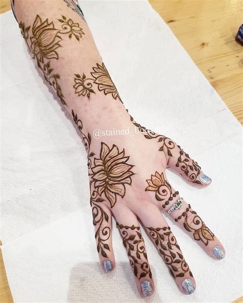 Although moroccan henna is usually applied to the feet, hands, wrists, ankles, fingers, and toes, many tourists opt for henna tattoos on other parts of the body. Arabic design using natural henna | Henna, Henna hand ...