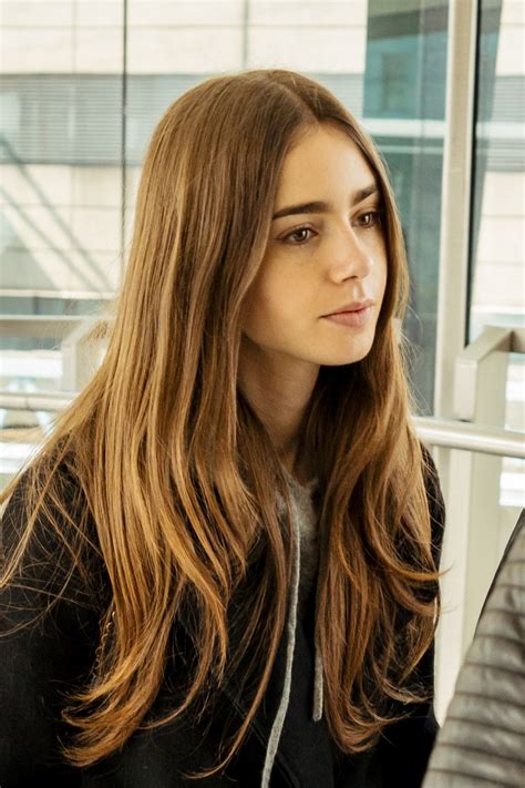 Lily collins as audrey hepburn (self.lilycollins). LILY COLLINS at Heathrow Airport in London 04/24/2019 ...