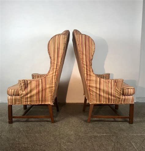 All communications occur between the buyer and the antique dealer, sellingantiques ltd is not involved or responsible for terms of sale. Dramatic Pair of Wing Back Scroll Arm Chairs Attributed to ...