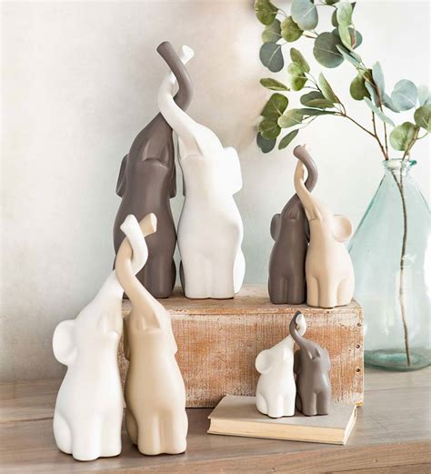 Plants with one or more hard, thin stems that branch out of their roots. Small Ceramic Elephants with Intertwined Trunks Sculptures ...