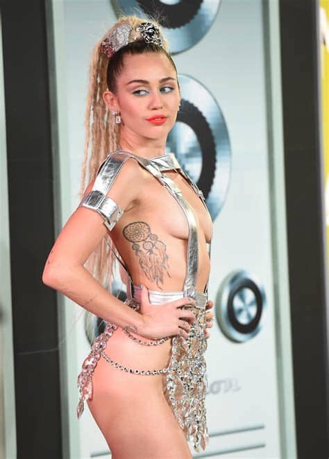 Stream tracks and playlists from miley cyrus on your desktop or mobile device. Miley Cyrus rocks an American flag-inspired outfit while ...