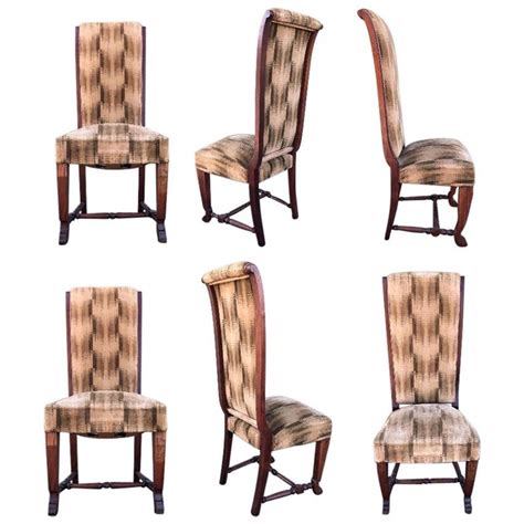 The 20th century provided us with a great range of modern new furniture created by innovative and forward thinking designers and architects. 20th Century Set of Six Deco Dark Walnut Refinished Tall Back Dining Chairs For Sale at 1stdibs