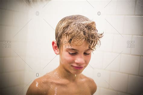 Nasty cayla lyons is dancing under the shower in the night club. Boy under the shower stock photo - OFFSET