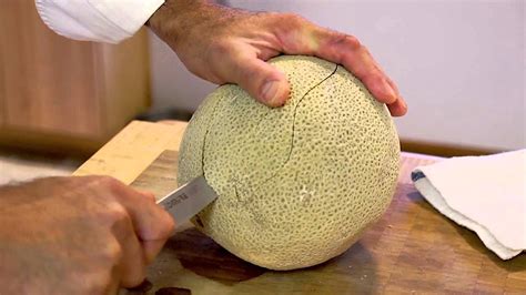 Lay a watermelon triangle on a carving board. How to Carve a Cantaloupe Into a Centerpiece : Chef ...