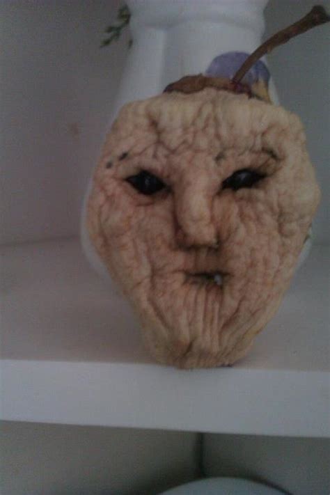Remove the core by pulling the apple core out. My grandmother makes shrunken heads from dried apples ...