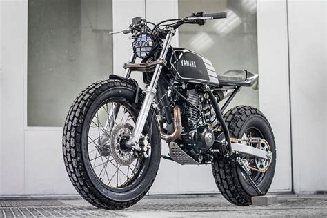 A garage for special motorcycles and cafe racers. MAKO // : TW // Fat Tracker: Wolf Moto's chunky Yamaha TW200