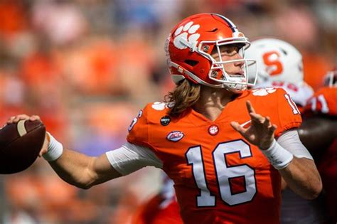 After winning the national championship last season, qb trevor lawrence is easily one of the case in point: Clemson QB Trevor Lawrence Posts Wedding Video & Pics On ...