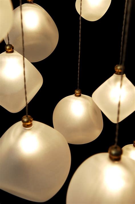 Use scissors to cut the wire down the center so that each side is about an inch or an inch and a half long. White-globe-multi-pendant-Lighting | VOYAGE | Multi ...