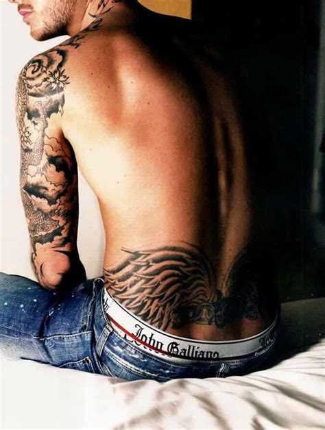 Speaking of spreading your creative wings, one of the most famous back tattoos that people get is without a doubt the angel wings tattoo. Lower Back Tattoos for Men - Ideas and Designs for Guys