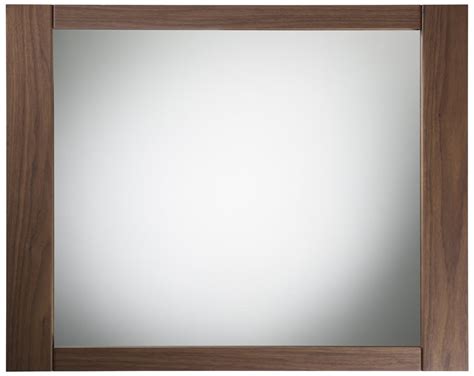 Handcrafted in the united states, this rectangular design showcases a solid frame with a backing, beautiful beveled glass. Object moved