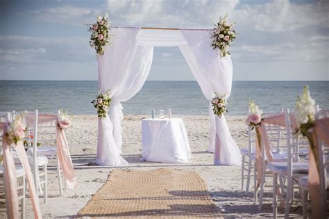 They had gorgeous weather and married pool side with their guests and their 2 jack russels who. Bamboo Arbor | Beach Ceremony Decor | Bamboo Wedding Arch| Florida Beach Wedding| Casa Ybe ...