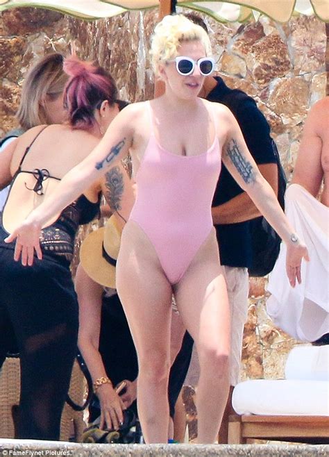 She was a paris model in the early days of her career. Lady Gaga shows off in a skimpy pink one-piece while ...