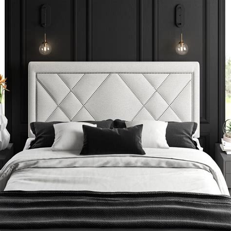 If your fabric has any wrinkles, iron it, then center it over the headboard, using clamps to hold it in place, if necessary. Mercury Row Garnes Upholstered Panel Headboard & Reviews ...