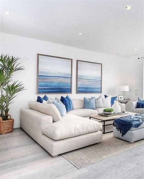 A great idea is to go with light blue additions! 10 gorgeous living room designs ideas to try 1 | White living room decor, Beach house decor ...