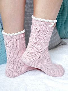 Check out the girly version with scalloped hems. Ravelry: "Young at Heart" Heart Cable Lace Placket Socks ...