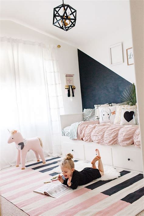 Create the ultimate fun kids play space for your little ones with this inspiring collection of kids playrooms. pink-black-and-white-rug pink-black-and-white-rug
