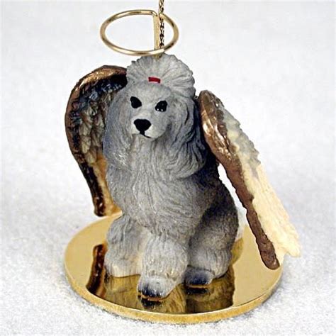 Bring a lot more holiday cheer to your tree with a custom ceramic ornament. Elegant Hand Painted Gray Poodle Figurine Adorned as an ...