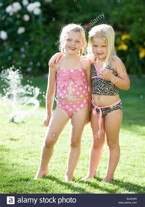 Beautiful women in their caskets. little girls in their swimsuits Stock Photo - Alamy
