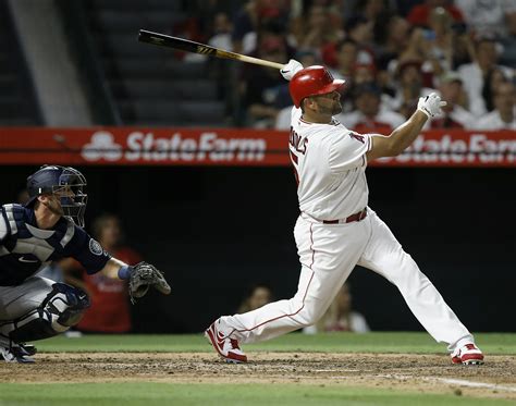 He made no putouts, had no assists. Albert Pujols predicts he'll be everyday player at age 39