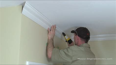 Cutting in with a brush on all of the trim sides and tops, feathering out, then going over with a roller. How To Cut & Install Crown Moulding - YouTube