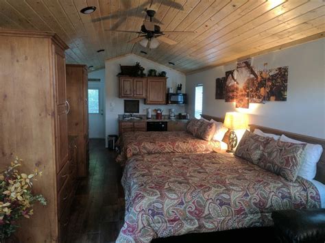 Cabin amenities include a hot tub, fireplace, firewood, fully equipped kitchen, and all linens provided. Wolf Creek Cabin - PAGOSA SPRINGS RV PARK, CABINS & ATV ...