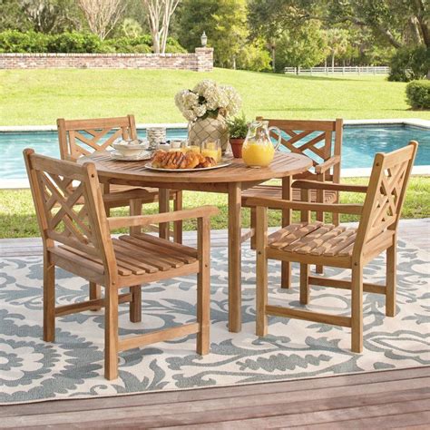Our teak patio dining tables will change your backyard or pool side into a sanctuary. Summerton Teak Dining Table | Round outdoor dining table, Teak dining table, Patio dining chairs