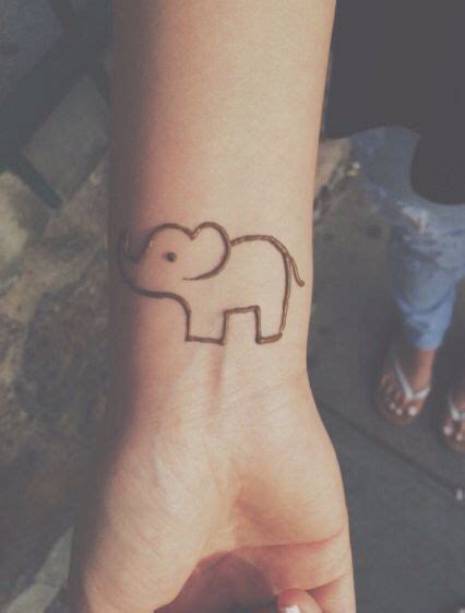 Black henna anchor tattoo on wrist. Easy elephant henna … | Henna tattoo, Simple henna tattoo ...