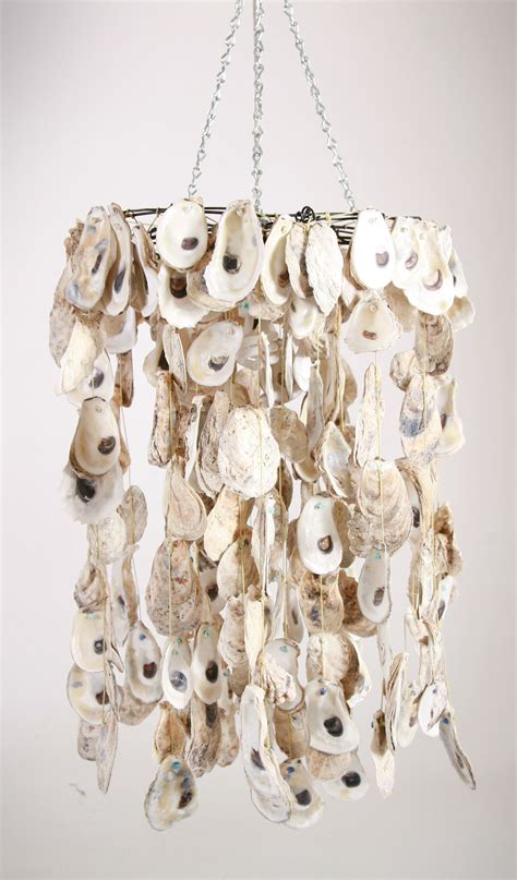 Green seaglass chandelier from pottery barn's chandelier collection. Oyster Shell Chandelier Light and Chandelier shell ...