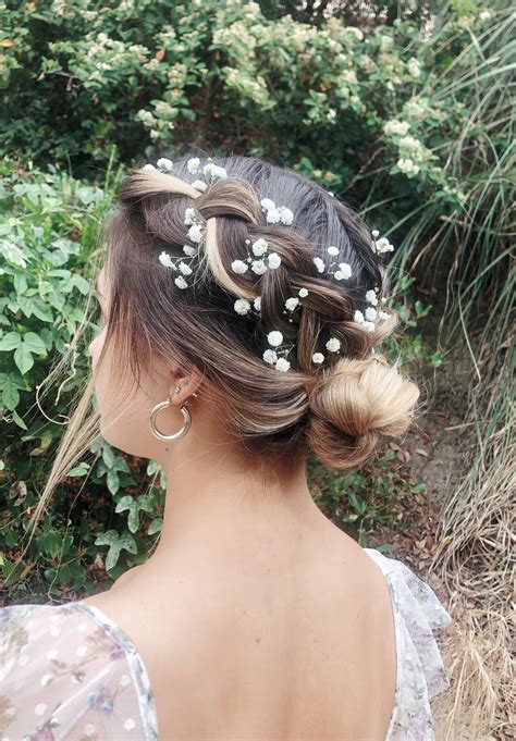 There are so many beautiful creations to experiment with in your hair including crown braids, side braids, the. Dutch braid bun w/ baby's breath!!! (With images ...